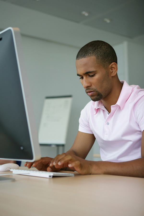 person typing on computer