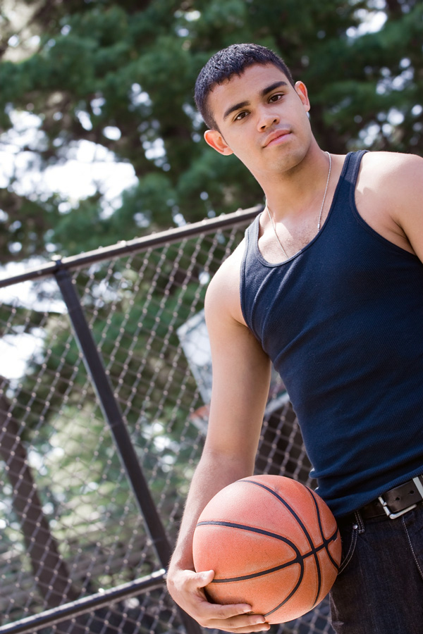 young adult with basketball