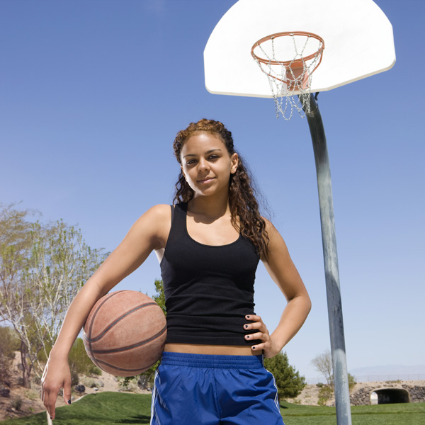Teenager holding basketball
