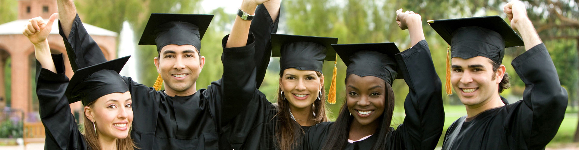 Group of college graduates celebrating at their graduation ceremony