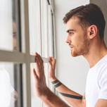 Youth looking out window | Psychosis Risk webinar [enable images to see]